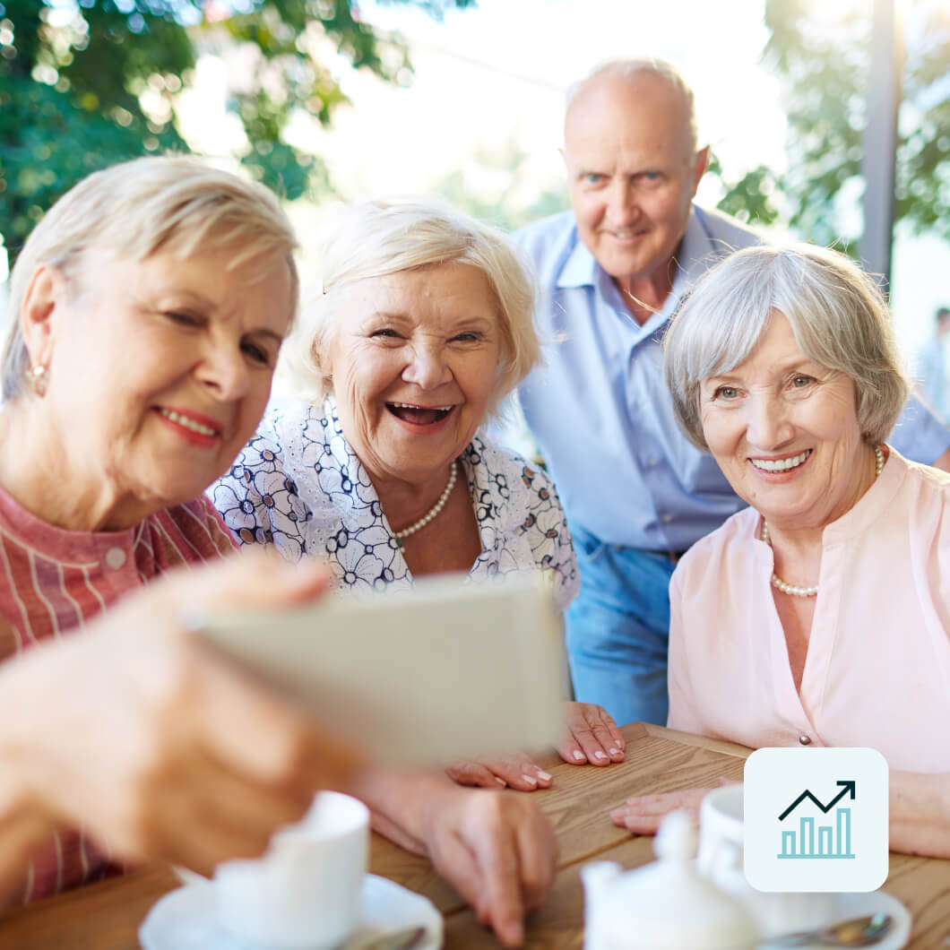 senior living friends taking selfie